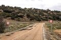 Lonely road with speed road sign