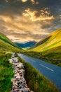 Lonely road on a valley among the mountains at the Lake District in England Royalty Free Stock Photo