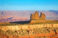 Lonely rock monument on the verge of Goosenecks canyon in Utah