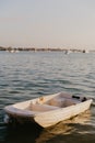 Lonely Rowboat On Peaceful Calm Water Ocean Bay