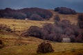 Lonely run down farm house or building on the aubrac plateau Lozere france. with cloudy skys Royalty Free Stock Photo