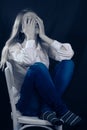 Lonely, Sad or in Pain young woman covering face Royalty Free Stock Photo