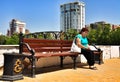 Lonely sad woman on the bench