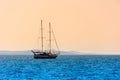 Lonely sailboat sails on the sea at dawn, beautiful landscape Royalty Free Stock Photo