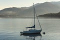 Lonely sailing boat is staying moored at Como lake, Italy Royalty Free Stock Photo