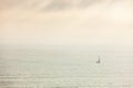 Lonely sailing ship at sea, concept of loneliness, achieving goals, dreams.