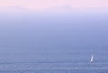 Lonely sailing yacht on background of blue sea