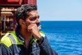 Young seafarer on the cargo ship.