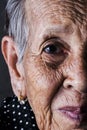 Lonely senior woman smiling in camera Royalty Free Stock Photo