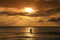 Lonely silhouette at sea sunset Royalty Free Stock Photo
