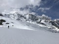 Lonely skier on alpine slope.