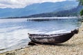 Lonely small boat on the edge of the maninjau lake