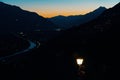 Lonely street light with view on mountains at night, Valais, Switzerland