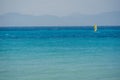 Lonely surfer on the Aegean Sea on Rhodos coast