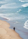 lonely surfer has the whole atlantic sea in algarve portugal to himself III