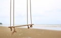 Lonely swing on the beach Royalty Free Stock Photo