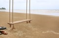 Lonely swing on the beach Royalty Free Stock Photo