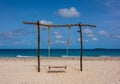 Lonely swing on the beach coast Royalty Free Stock Photo