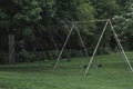 Lonely Swing set waiting for children to come and play