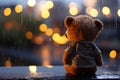 Lonely teddy bear weeps by the window, rain and bokeh Royalty Free Stock Photo