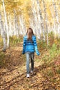 Lonely teenage girl in the autumn