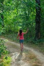 Lonely teenage girl in the spring forest