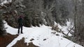 Lonely tourist in the mountains Royalty Free Stock Photo