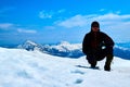 Lonely tourist on snowy mountain