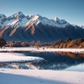 The Lonely tree of Lake Wanaka, South Island, New Zealand, at the morning light and the snow clad Remarkables at the