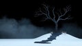 Lonely tree on snowy hill with fog in dark atmosphere Royalty Free Stock Photo