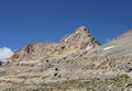 Lonely truck going by mountain road