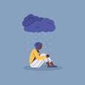 Lonely unhappy depressed teenage girl sitting on floor in rain from dark cloud