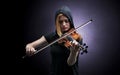 Violinst playing on instrument with empathy