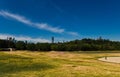 Lonely walker in riverdale park Royalty Free Stock Photo