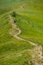 A lonely wanderer on a mountain trail, Bieszczady Mountains, Poland Royalty Free Stock Photo