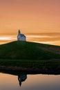 White church on a hill, de Terp reflected in water  at sunrise, the Hague, Netherlands Royalty Free Stock Photo