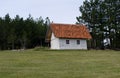 Lonely white house on a hill Royalty Free Stock Photo