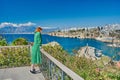 Lonely white young woman in deserted Turkish resort of Antalya.