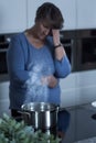 Lonely widow cooking Royalty Free Stock Photo