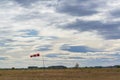 Lonely windsock at the empty airfield