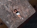 Lonely woman alone - Beautiful aerial Riga port and river Daugava lanscape shots from drone - Top view from above Royalty Free Stock Photo