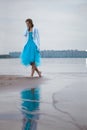 Lonely woman on the beach Royalty Free Stock Photo