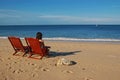 Lonely woman on the beach Royalty Free Stock Photo