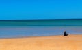 Lonely woman at the beach