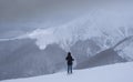 Lonely woman facing a challenge in the mountains, Pyrenees