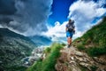 Lonely woman hiker in a path Royalty Free Stock Photo