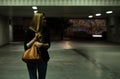 Lonely woman in the underpass Royalty Free Stock Photo