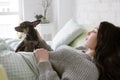 Lonely woman wake up with dog Royalty Free Stock Photo