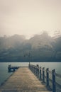 A Lonely Wooden Pier at Glenorchy on Lake Wakatipu with Vintage Colour Effects