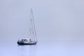 Lonely yacht in blue sea Royalty Free Stock Photo